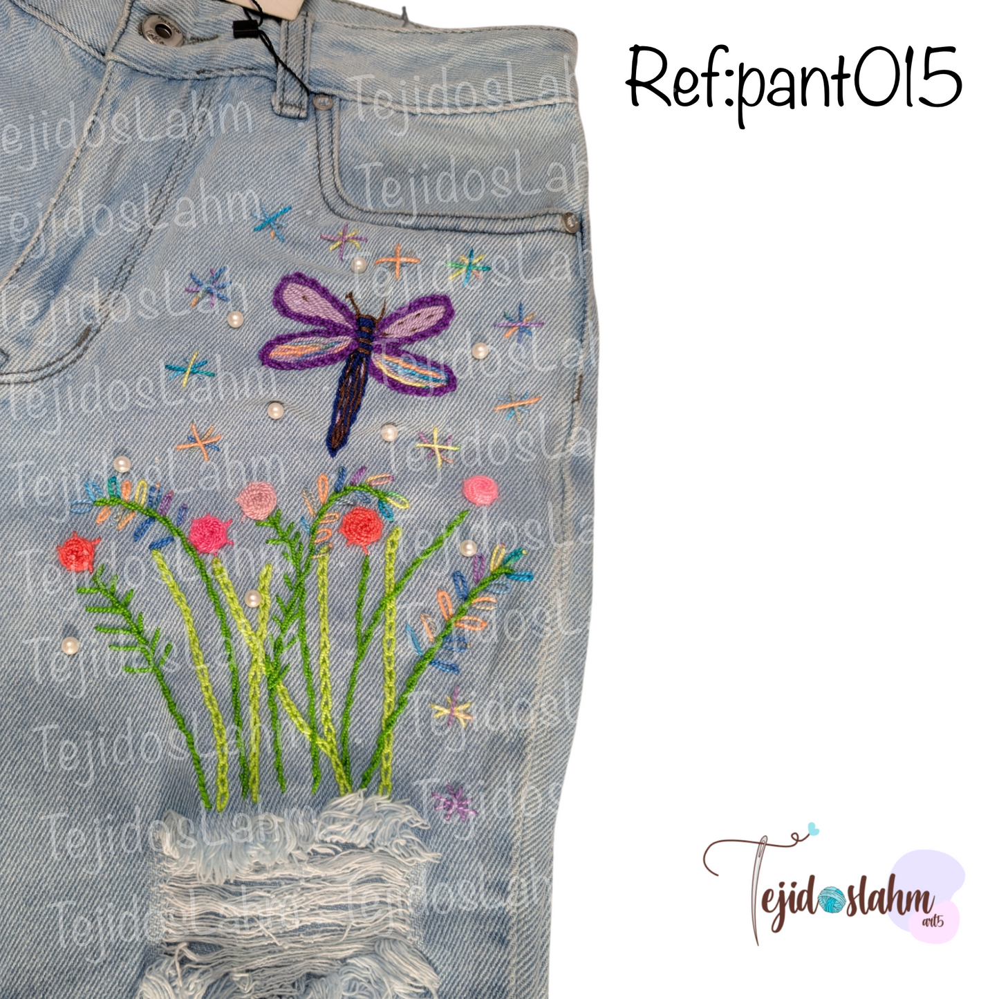 Pantalón de jeans bordado flores y libélula