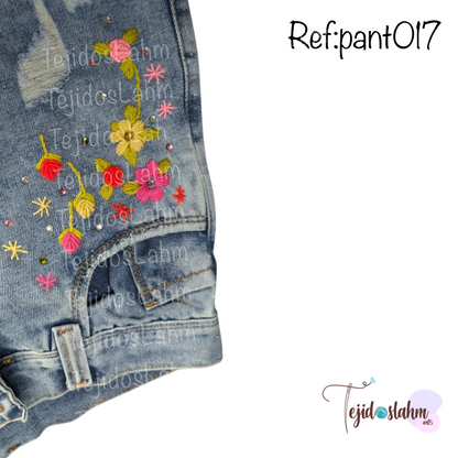 Pantalón de jeans bordado con ornamentos florales