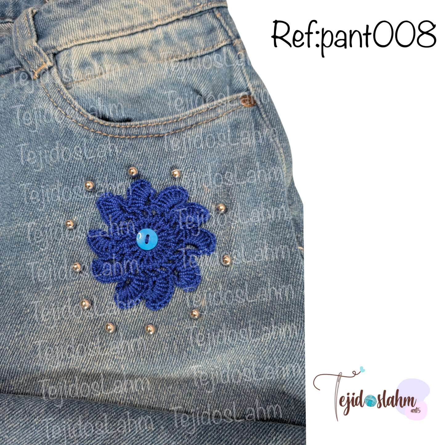 Pantalón de jeans con flores y gato bordado