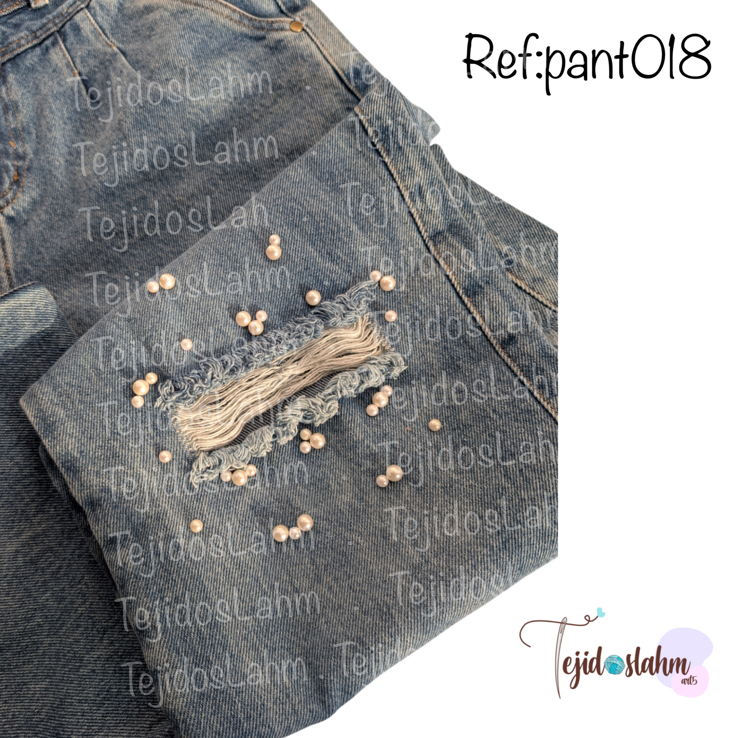 Pantalón de jean con aplicación de perlas blancas