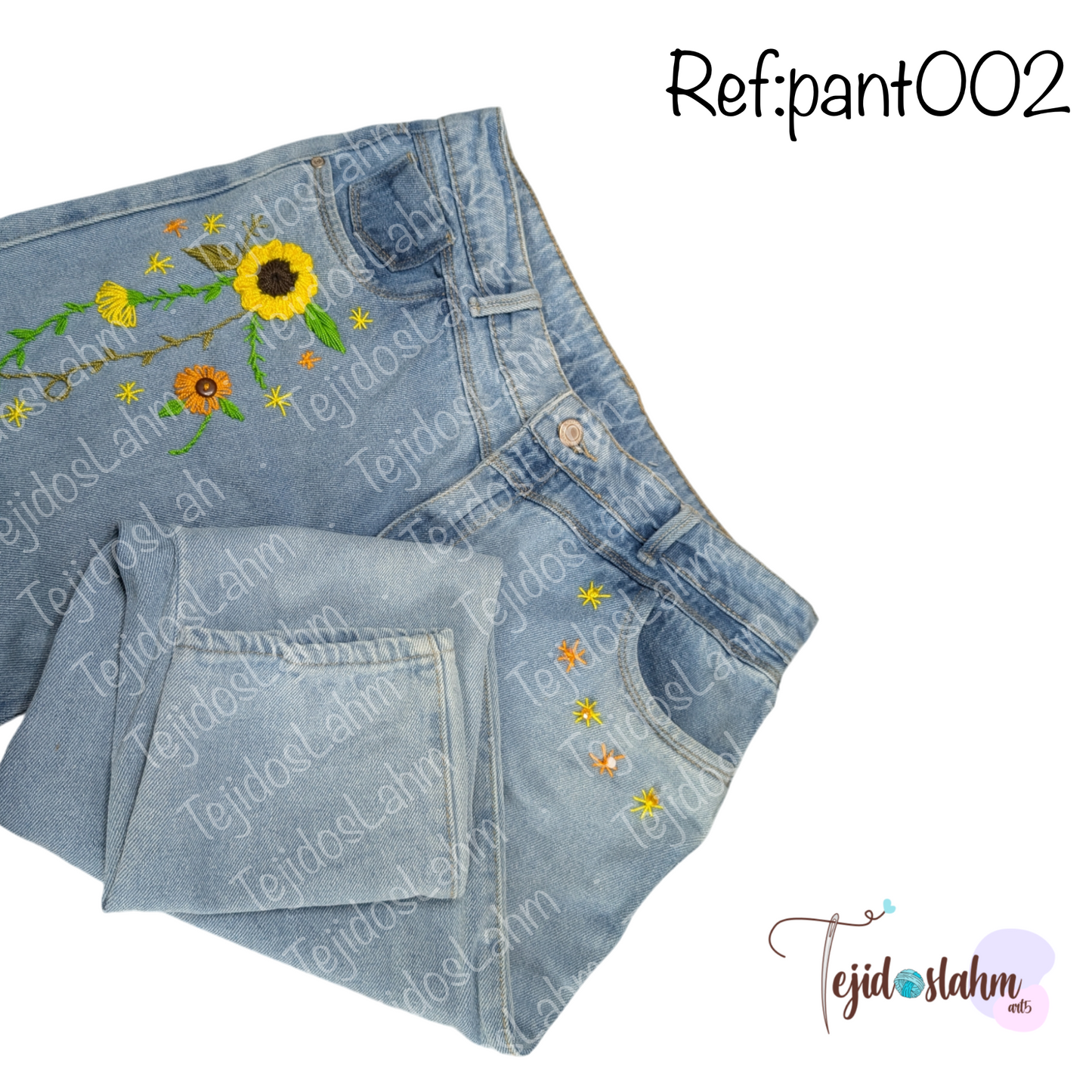 Pantalón de jeans girasoles bordado