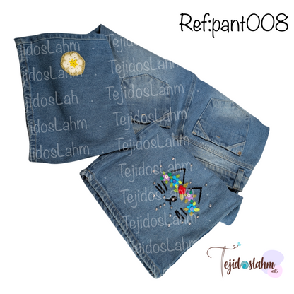 Pantalón de jeans con flores y gato bordado