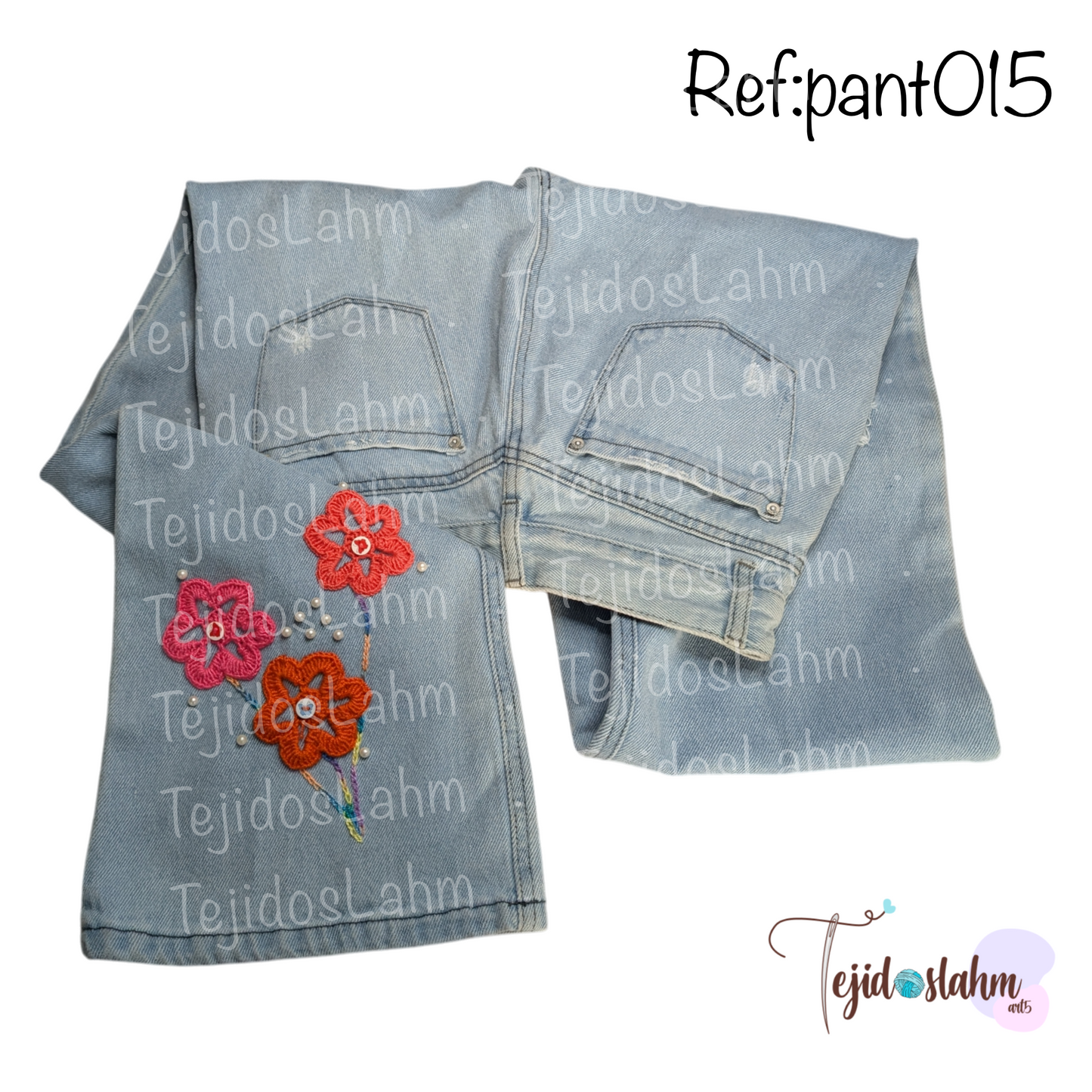 Pantalón de jeans bordado flores y libélula